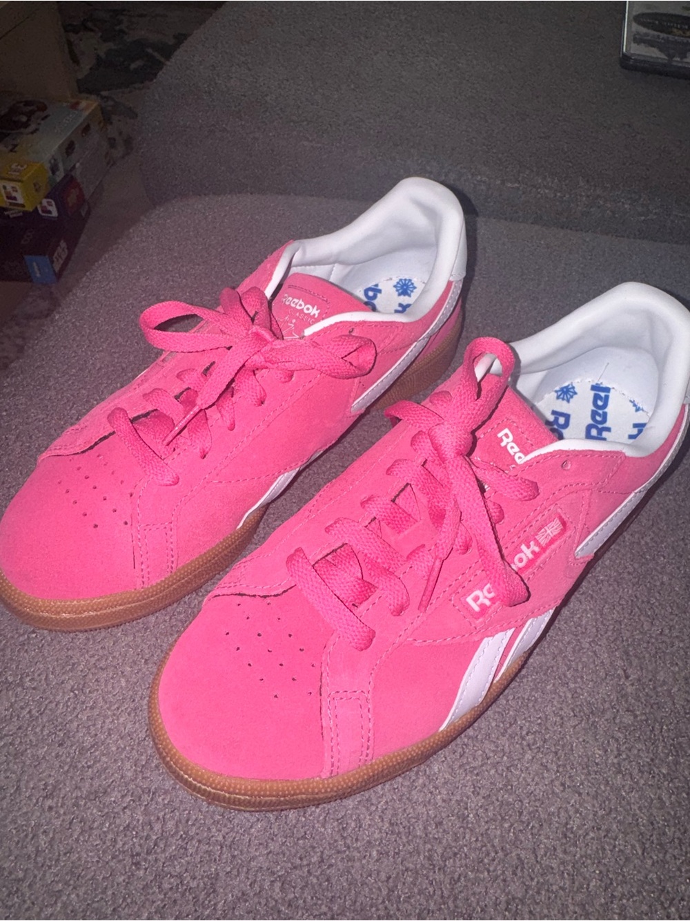 Reebok Pink Suede Sneakers with White Stripe